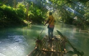 Man Drives the Bamboo Rafting, Ocho Rios Jamaica