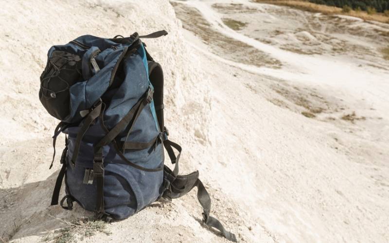 Travelling Backpack on Sand