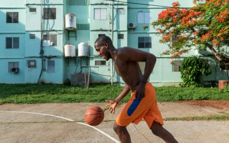 Man Playing Outdoor Basketball, Cuba