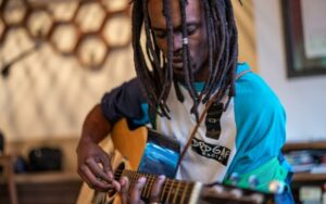 Blackman Playing Guitar, Reggae