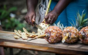 Haiti Woman Chopping Fruits